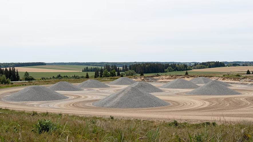 Frankware Resources operational site — aggregate piles in field